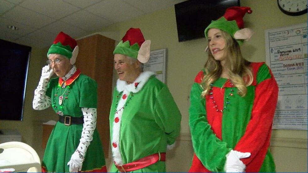 Sharon Bunn (L) and her "elves." (Source: Matt Clegg/WTVM)