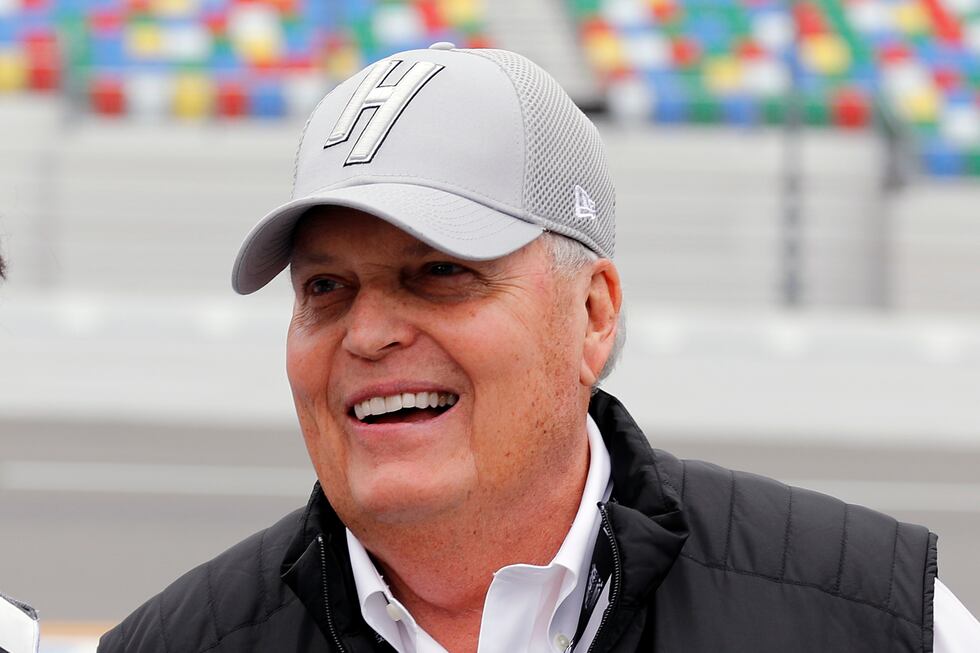 FILE - NASCAR team owner Rick Hendrick laughs on pit road during qualifying for the Daytona...