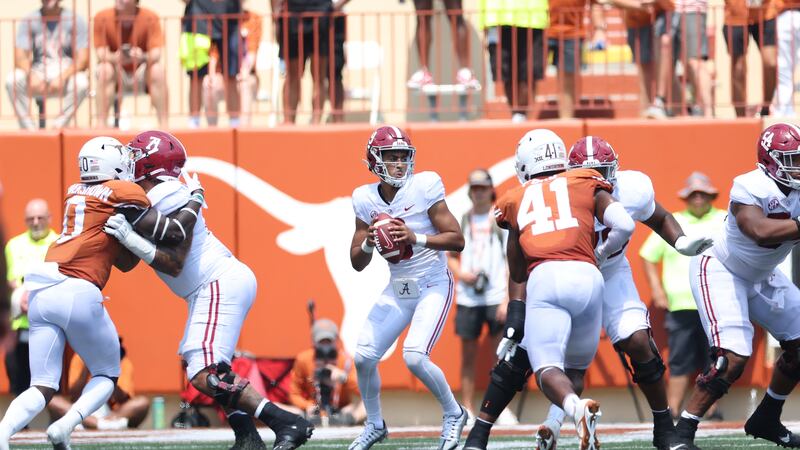 Alabama quarterback Bryce Young (9) back to pass against Texas at Darrell K RoyalÐTexas...
