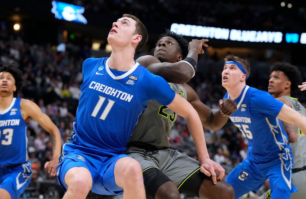 Creighton center Ryan Kalkbrenner, left, and Baylor forward Jonathan Tchamwa Tchatchoua wait...