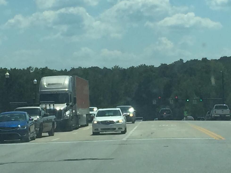 Traffic backed up on I-85 where a man falsely claimed he was being held at gunpoint on...