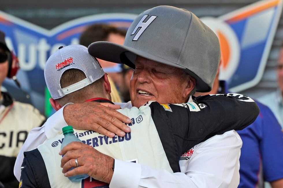 Team owner Rick Hendrick, right, hugs driver William Byron after he won the NASCAR Cup Series...