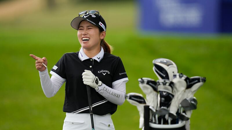 Yuna Nishimura, of Japan, gets ready to tee off the 18th hole before the Women's PGA...