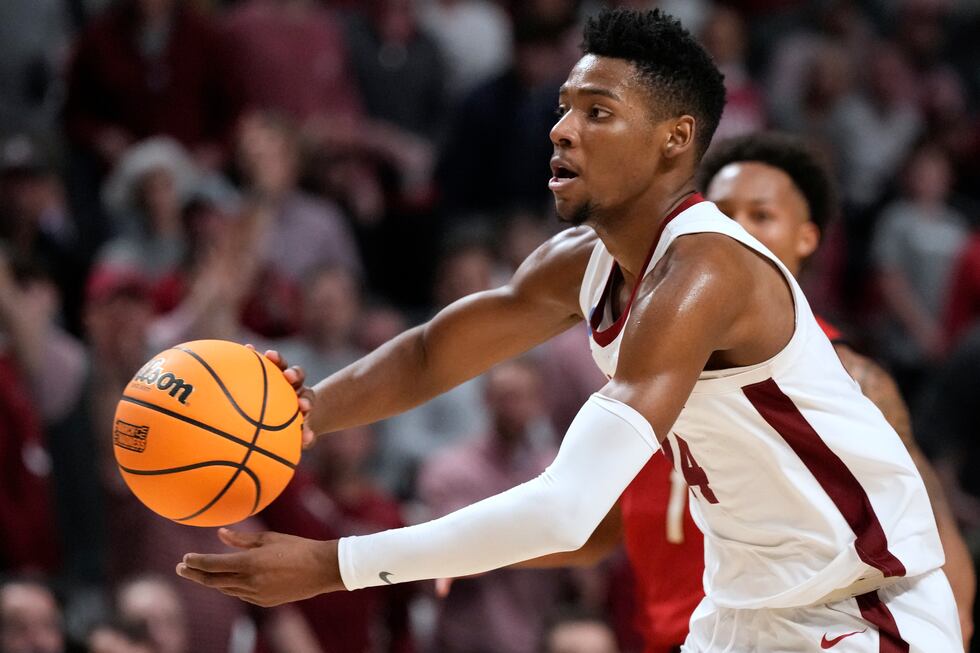 Alabama forward Brandon Miller passes the ball during the second half of the team's...