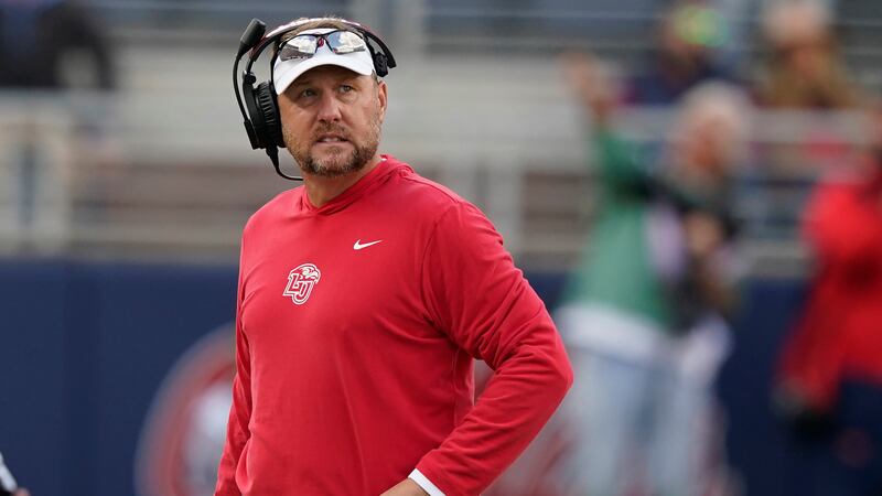 Liberty head coach Hugh Freeze looks towards his team during the second half of an NCAA...