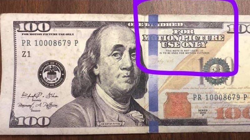 Prop $100 bill labeled "for motion picture use only."