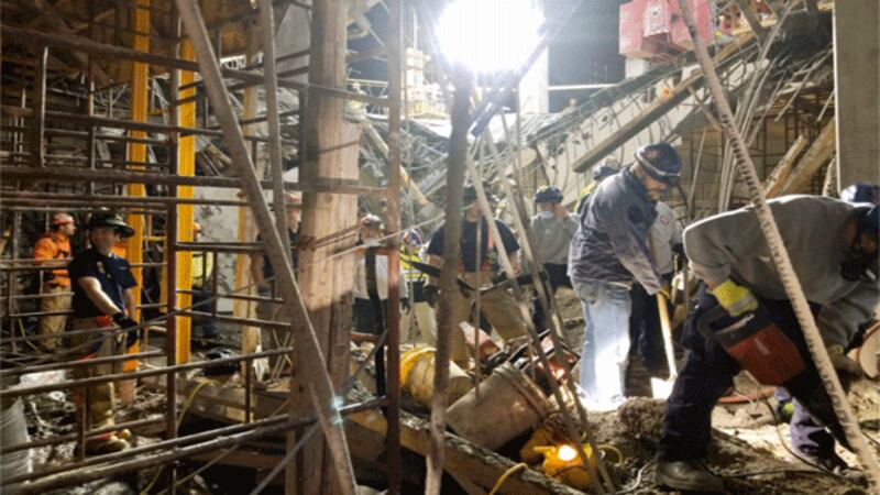 The search continues early Tuesday for a worker missing in a partial building collapse on...
