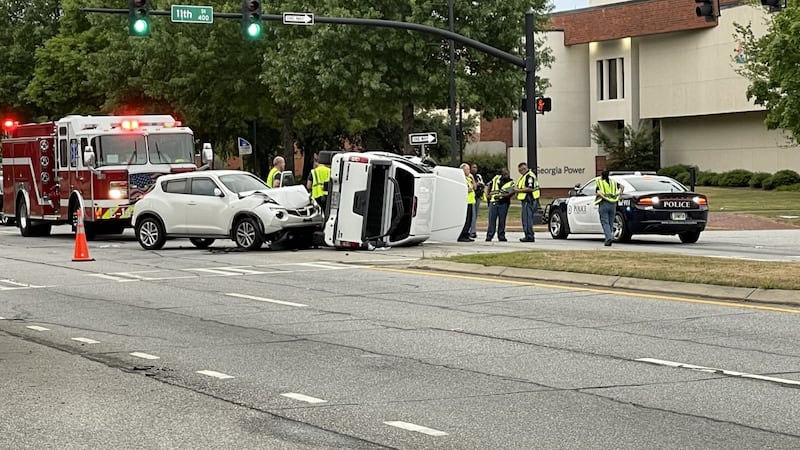 Emergency crews are currently on the scene of a car accident in front of Georgia Power on 11th...