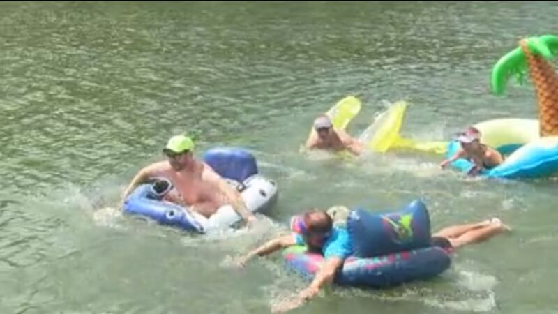 Families and triathletes float along the river to kickoff their labor day. (Source: WTVM)
